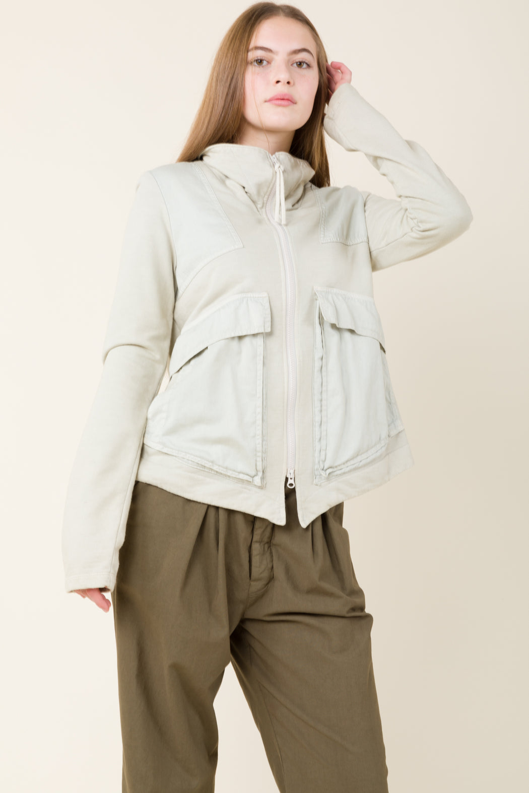 The Hunter jacket is a contemporary zip-up sweatshirt composed of 100% organic cotton, with soft sateen overlays, deep gusseted pockets, and a zip all the way up the neckline, perfect for all-year wear. 