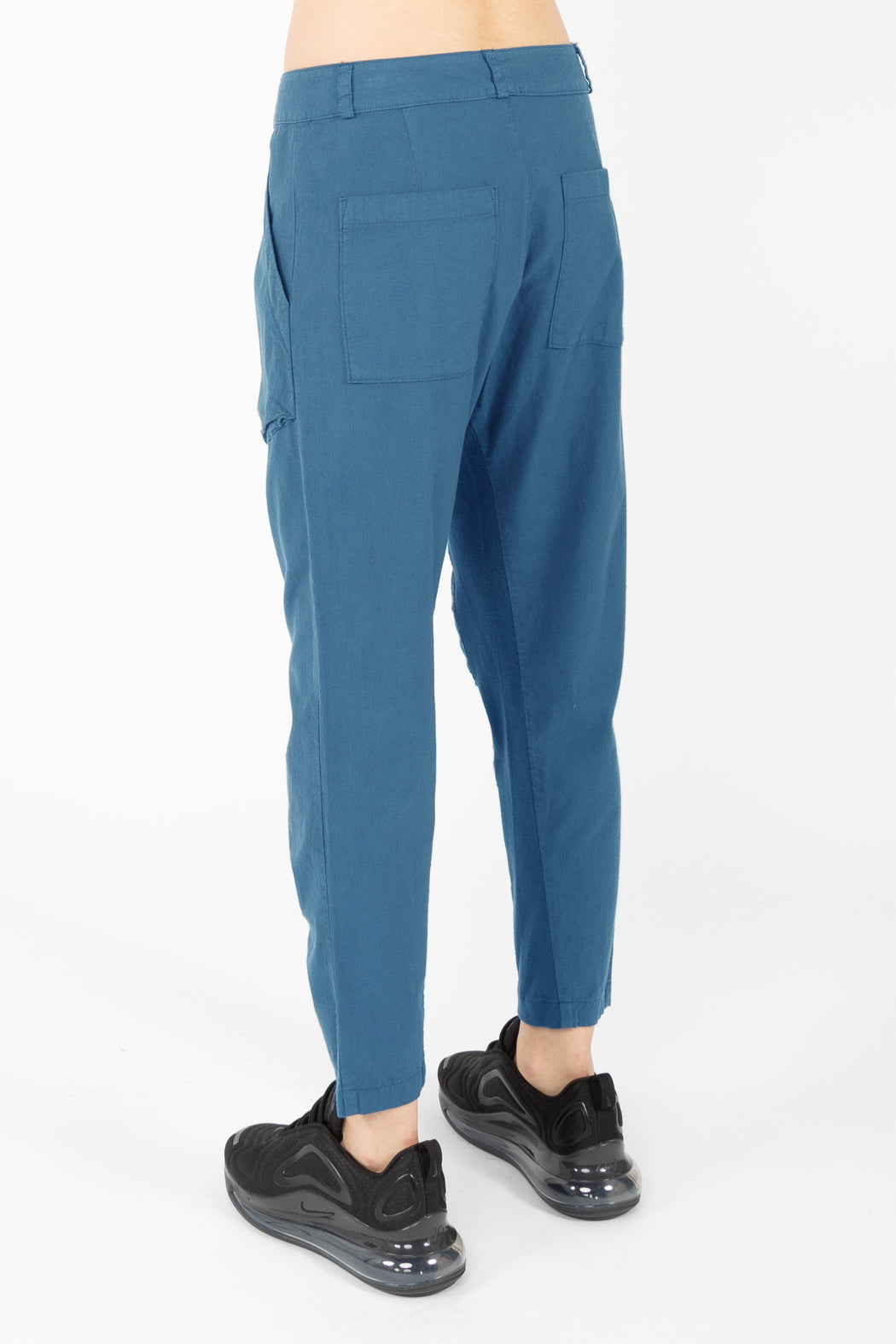 An incredibly soft, relaxed, lightweight pant with an organic cotton muslin body has an organic cotton knit inset at the inseam for style and comfort. A mid-rise, exposed button fly pant with deep gusseted front pockets, back patch pockets and belt loops.The softened cotton will loosen with wear, the initial fit should be snug.